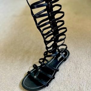 Calf half black gladiator sandals
